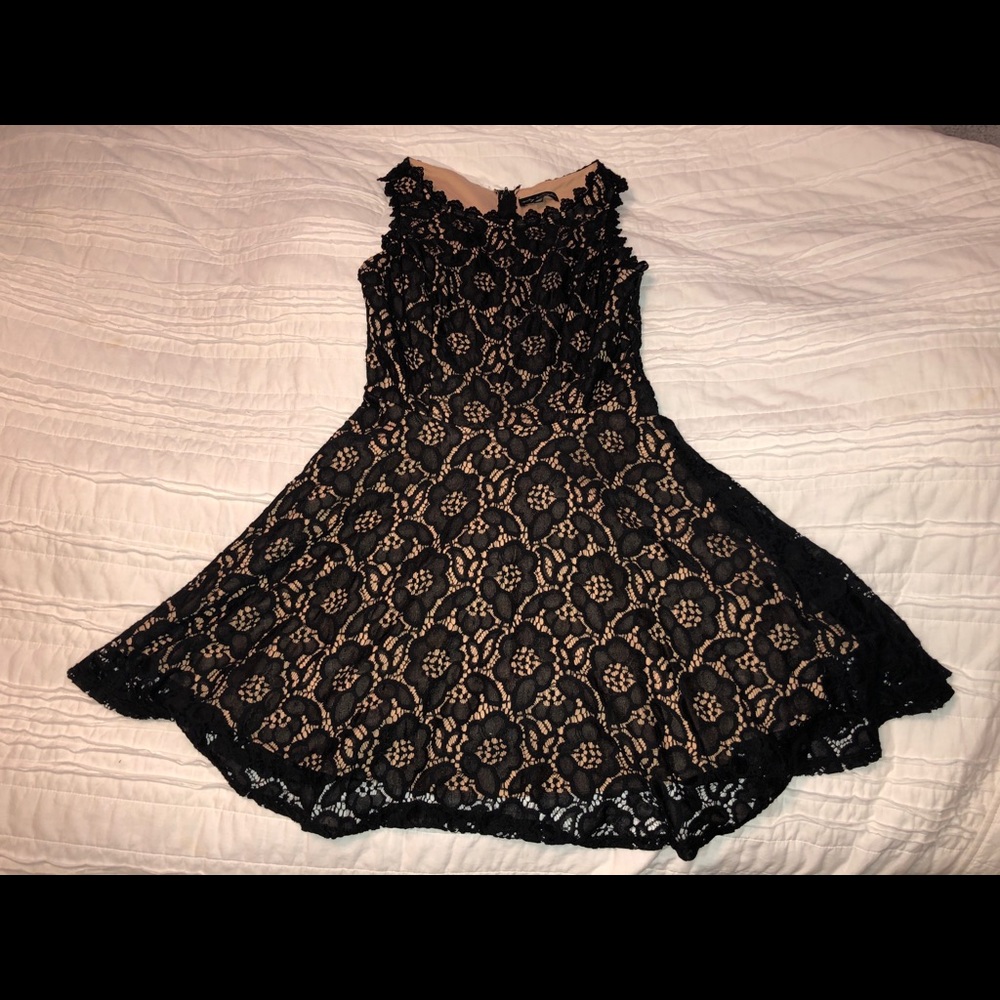 Sleeveless, black lace flower dress
